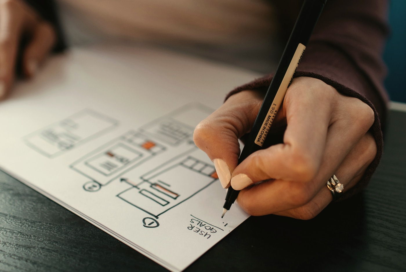 Professionals collaborating in a meeting, representing advisory work with leadership teams